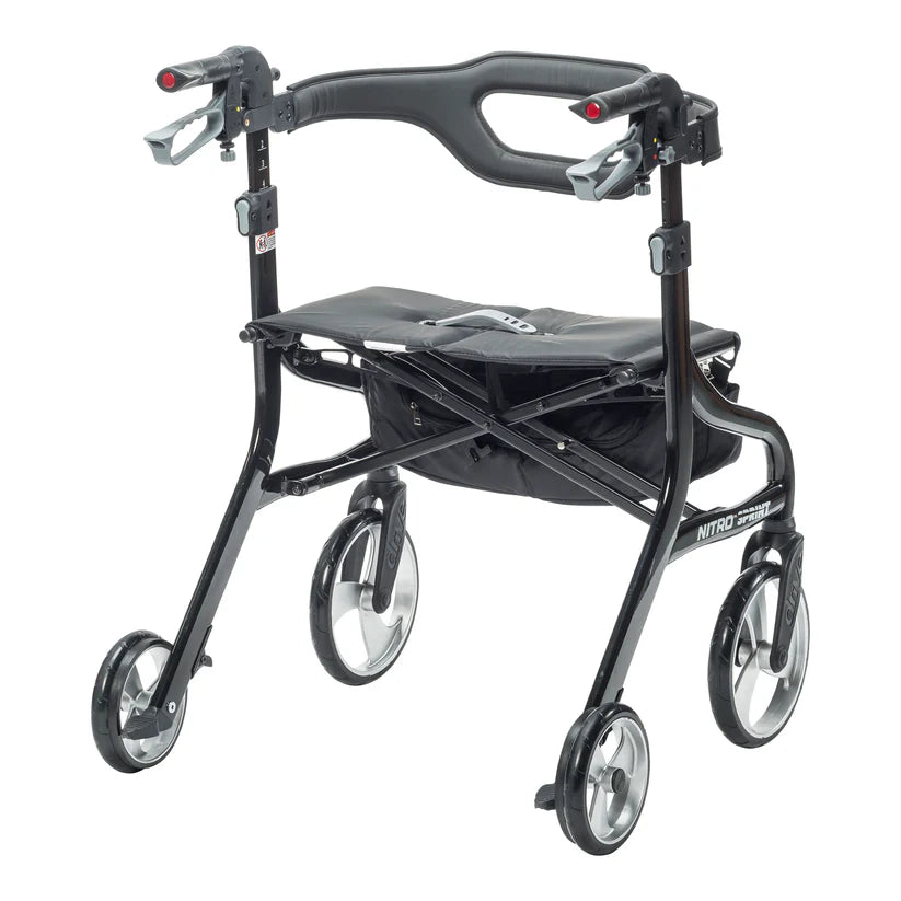 Black rollator with four wheels on a white background
